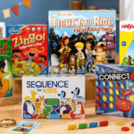 Best board games for 5 year olds displayed on a playroom table, including Outfoxed, Zingo, Ticket to Ride First Journey, Sequence for Kids, Connect 4, Animal Upon Animal, and Trouble.