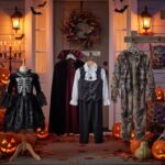 scary halloween costumes for kids displayed on a decorated Halloween porch with ghost, skeleton, vampire, werewolf and hooded costume styles